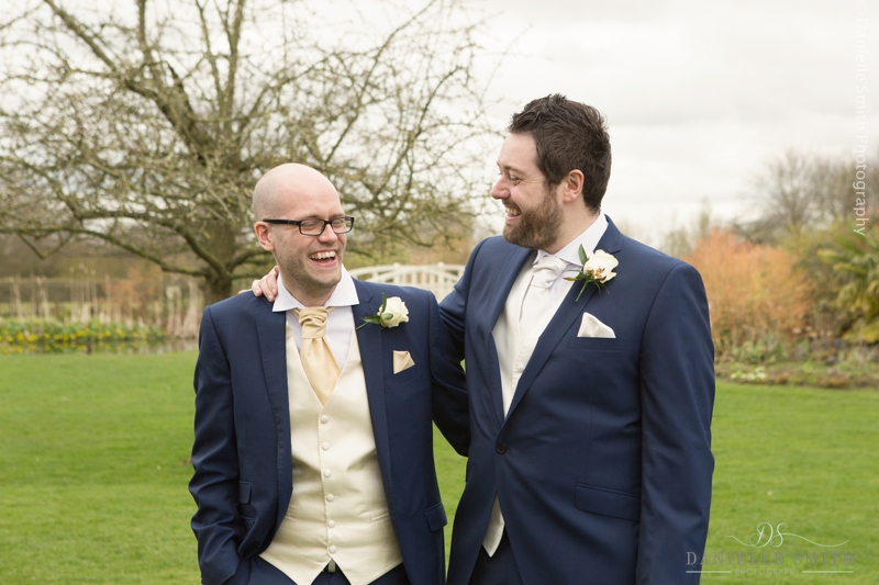 groom and best man laughing - spring wedding