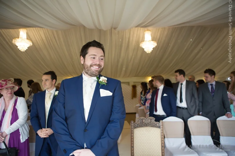 groom waiting for bride at front of aisle father walking bride down aisle - Fennes wedding photographer