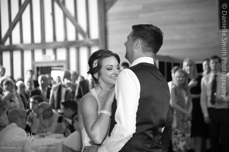 bride and groom laughing during first dance