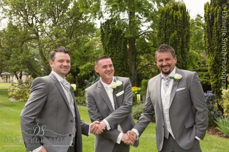 groom shaking best mens hands