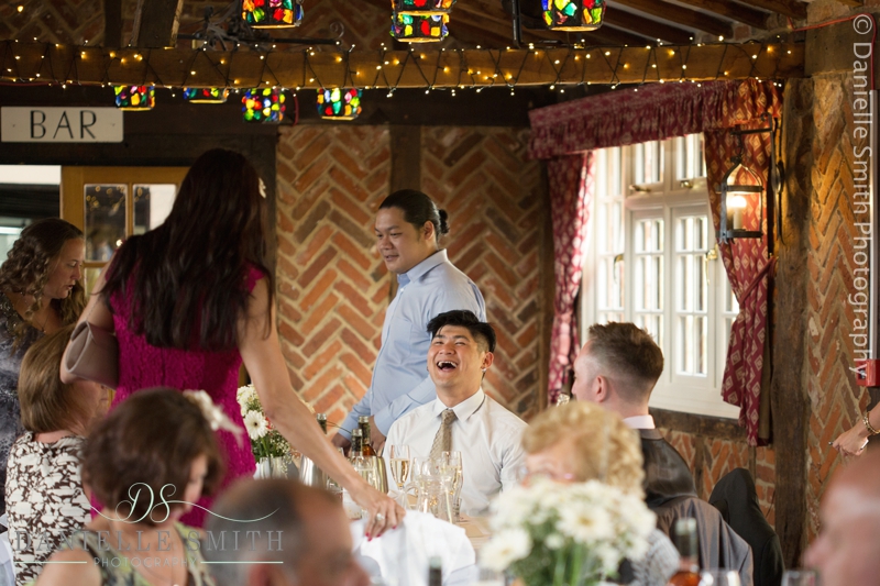 wedding guests laughing