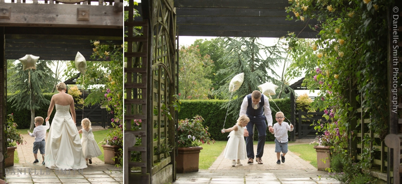 bride and groom with page boy and flower girl