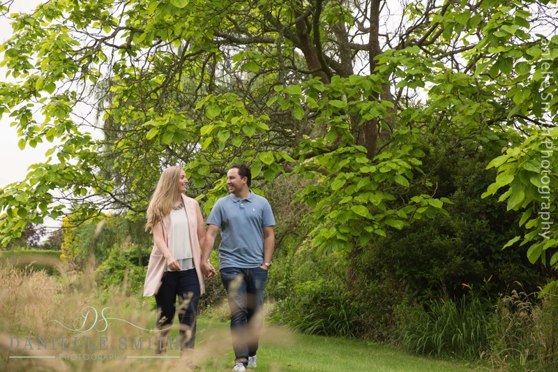 pre-wedding garden photo shoot - couple walking