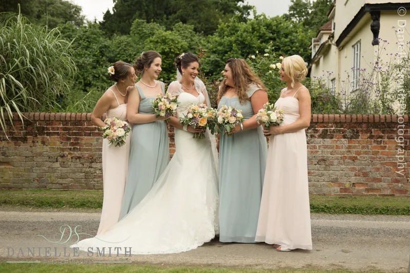 soft pink and green bridesmaids with bride