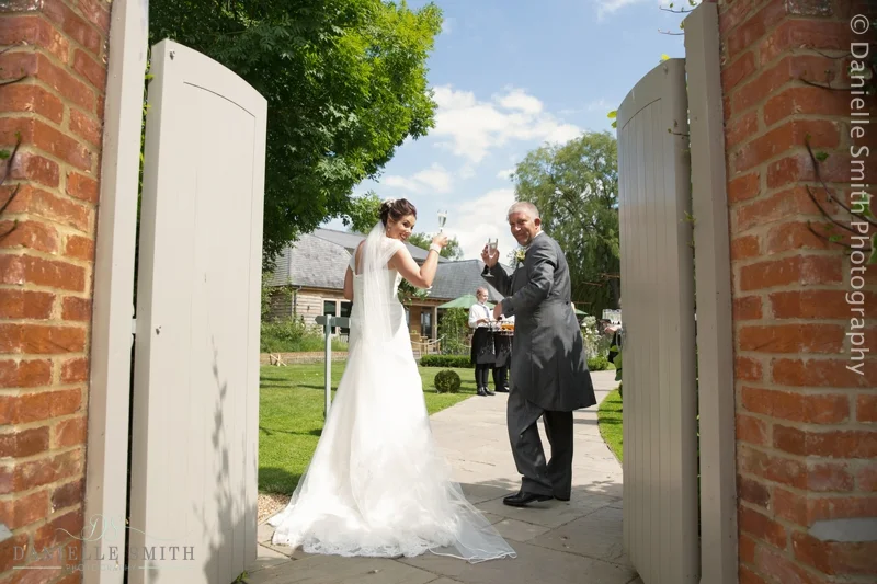 bride and groom toasting after married