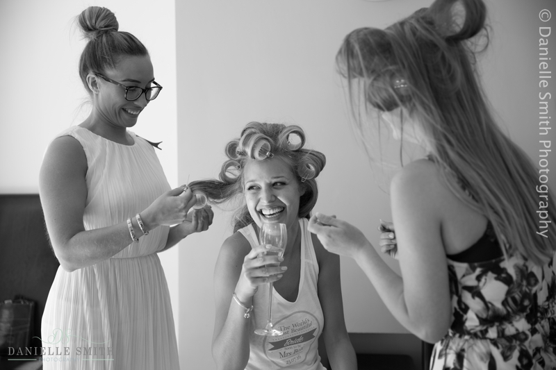 bride laughing having hair and make up done - old brook barn wedding