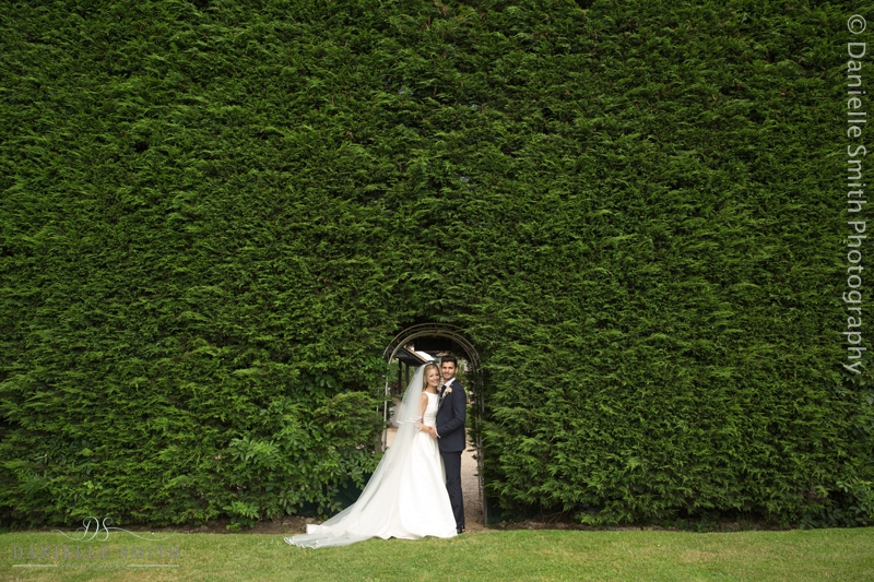 bride and groom in secret garden - old brook barn wedding