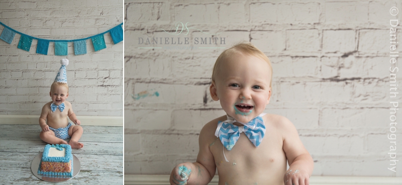 boy eating blue birthday cake - cake smash photography essex