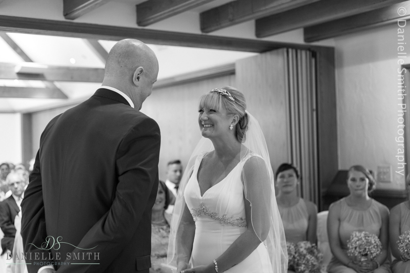 bride and groom during ceremony - mulberry house wedding