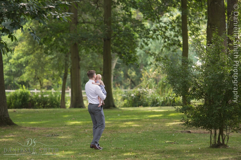 man holding his baby
