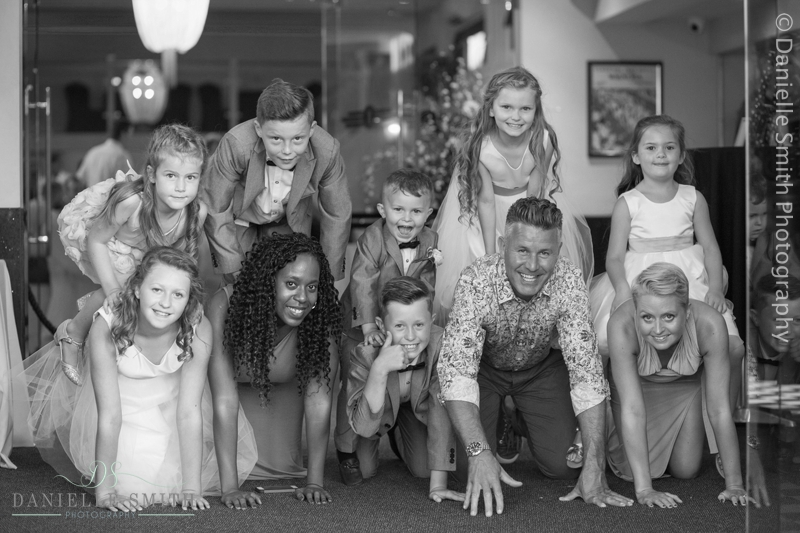 wedding guests making tower of people
