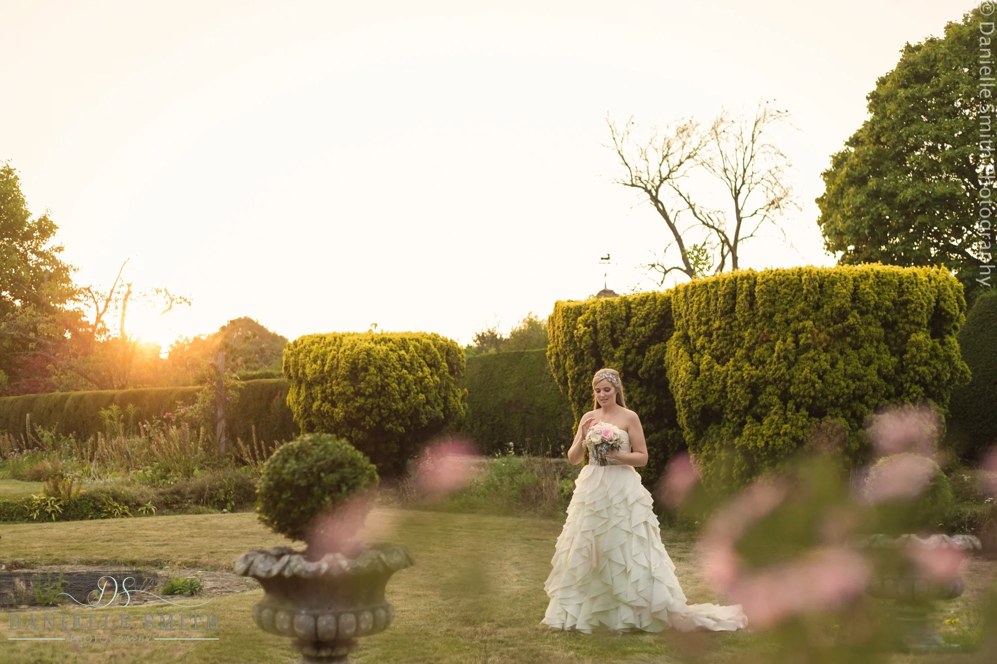 bride looking at her bouquet