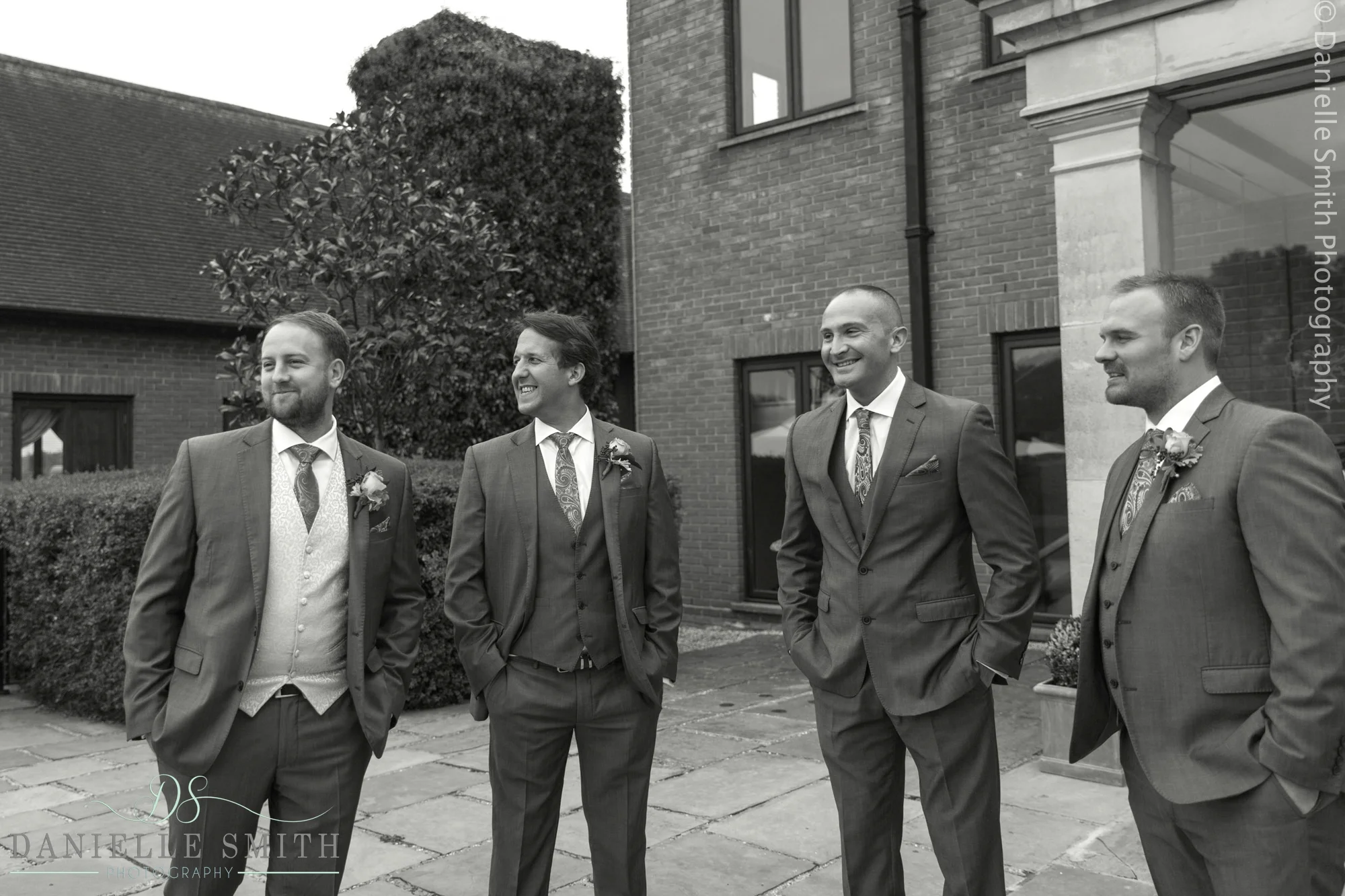 candid photo of groom and groomsmen