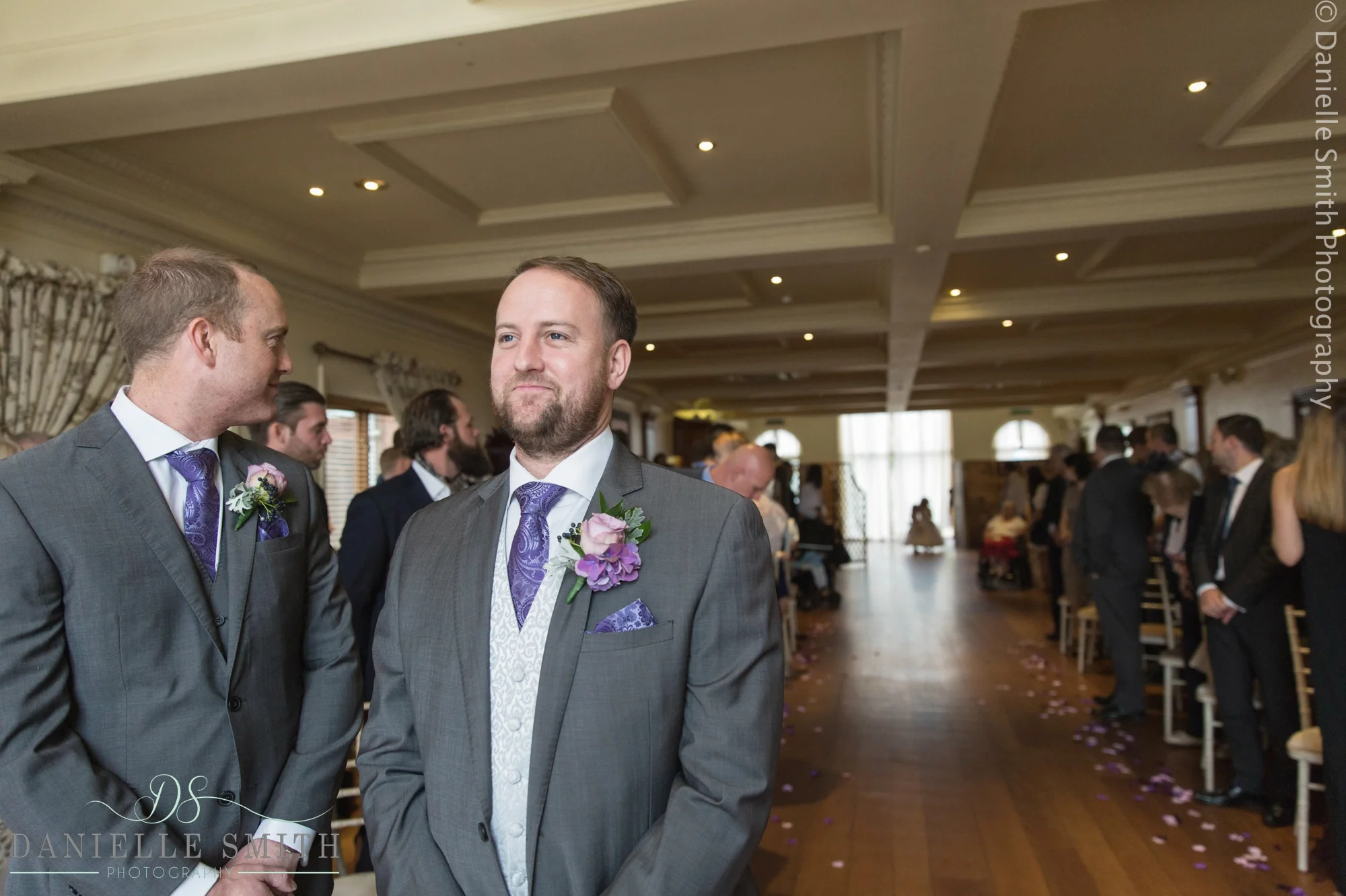 groom waiting for bride to walk down aisle