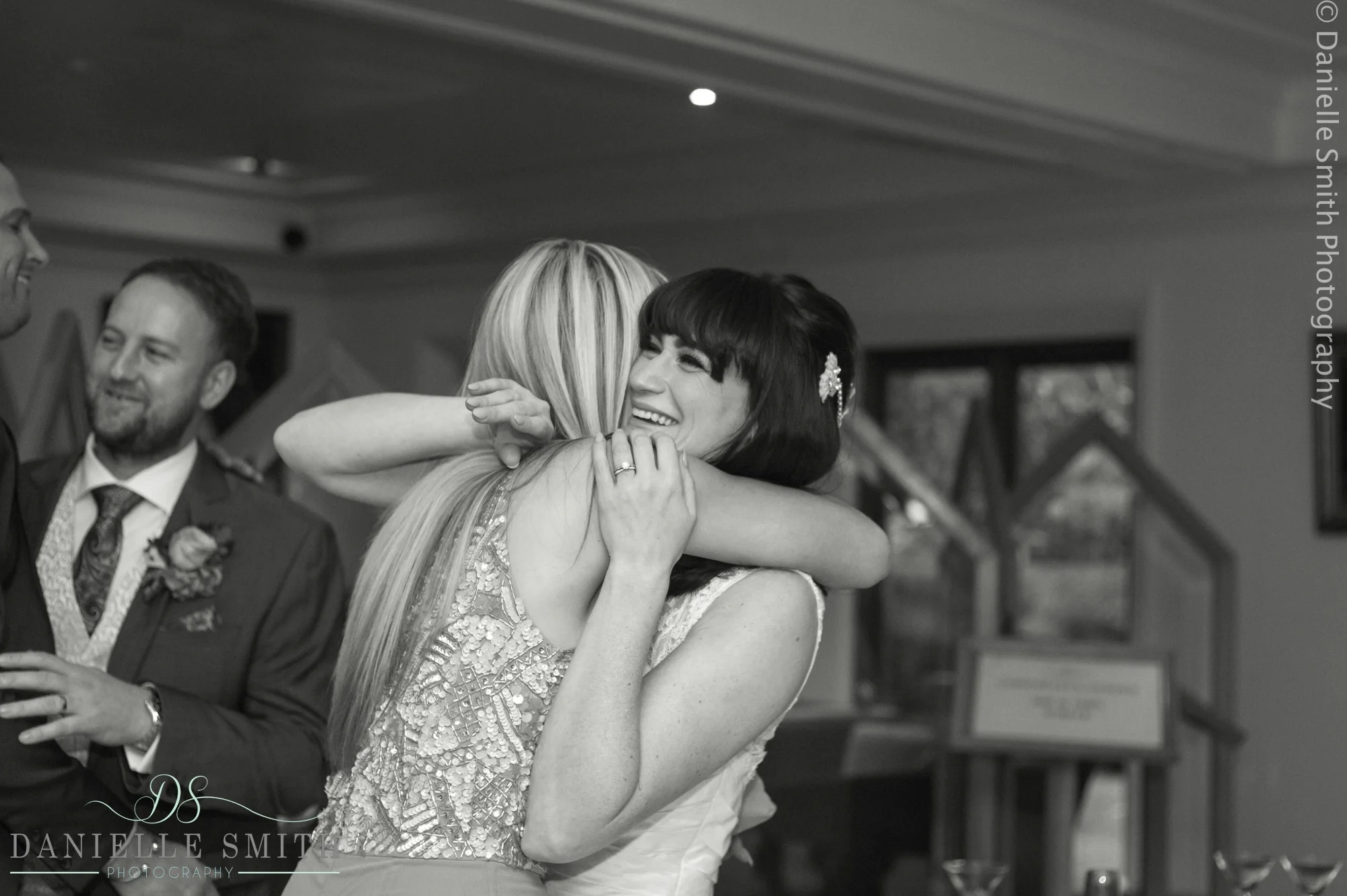 bride hugging her friend
