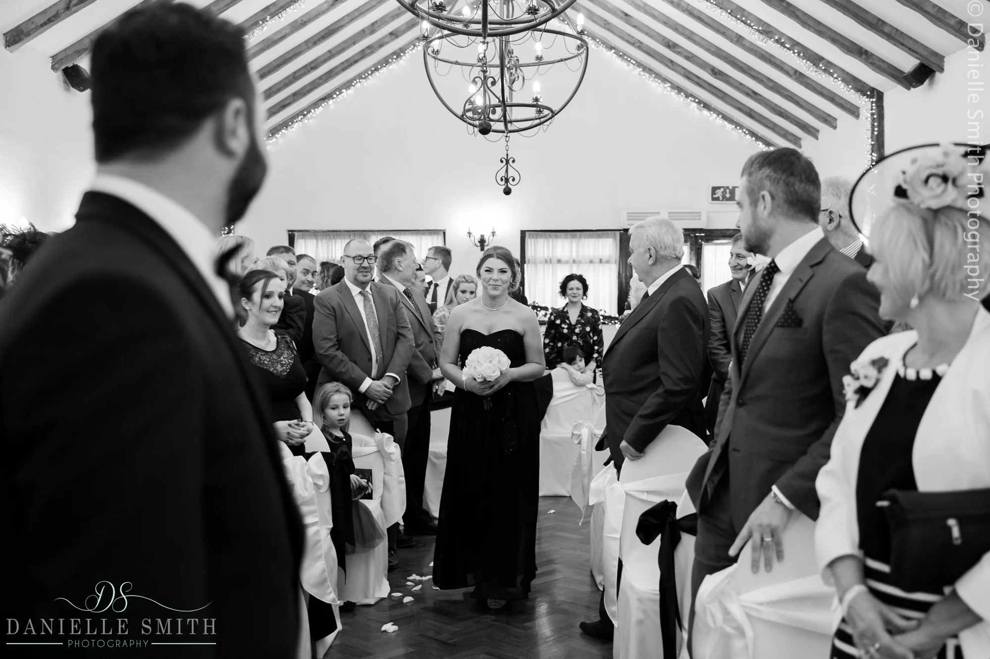 bridesmaids walking down aisle - crondon park wedding