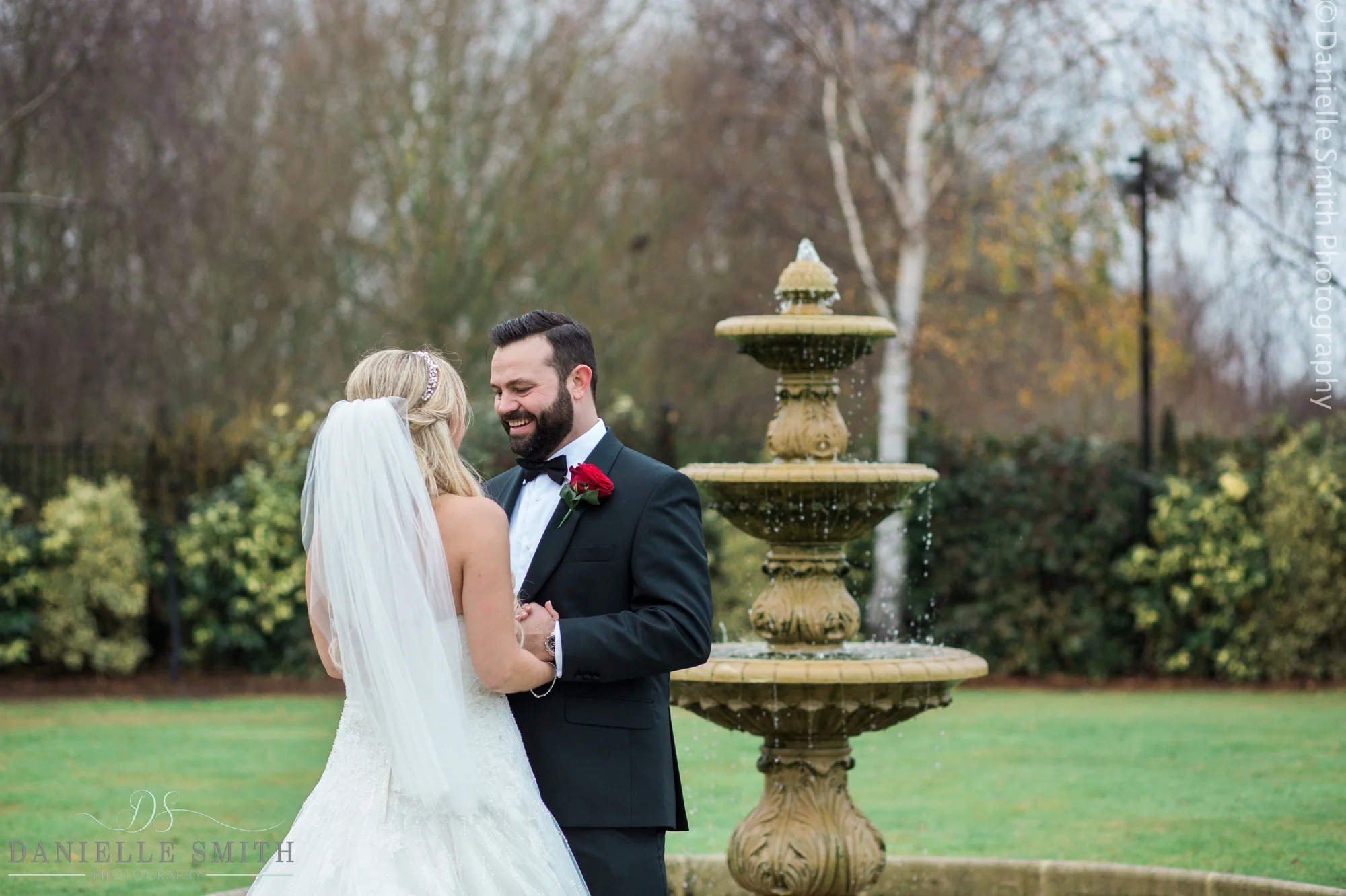 bride and groom by fountain at crondon park