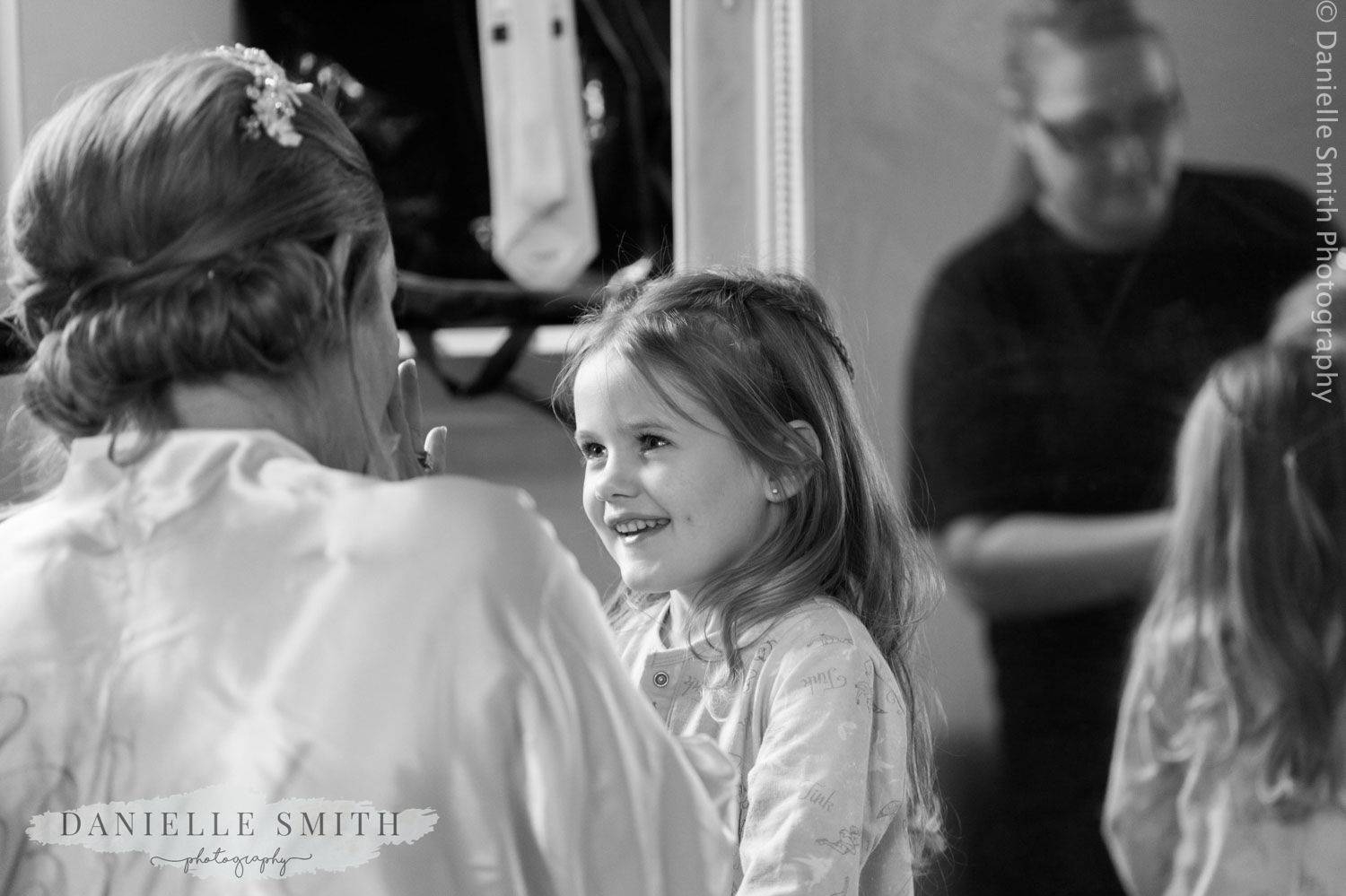 flower girl and mum getting ready