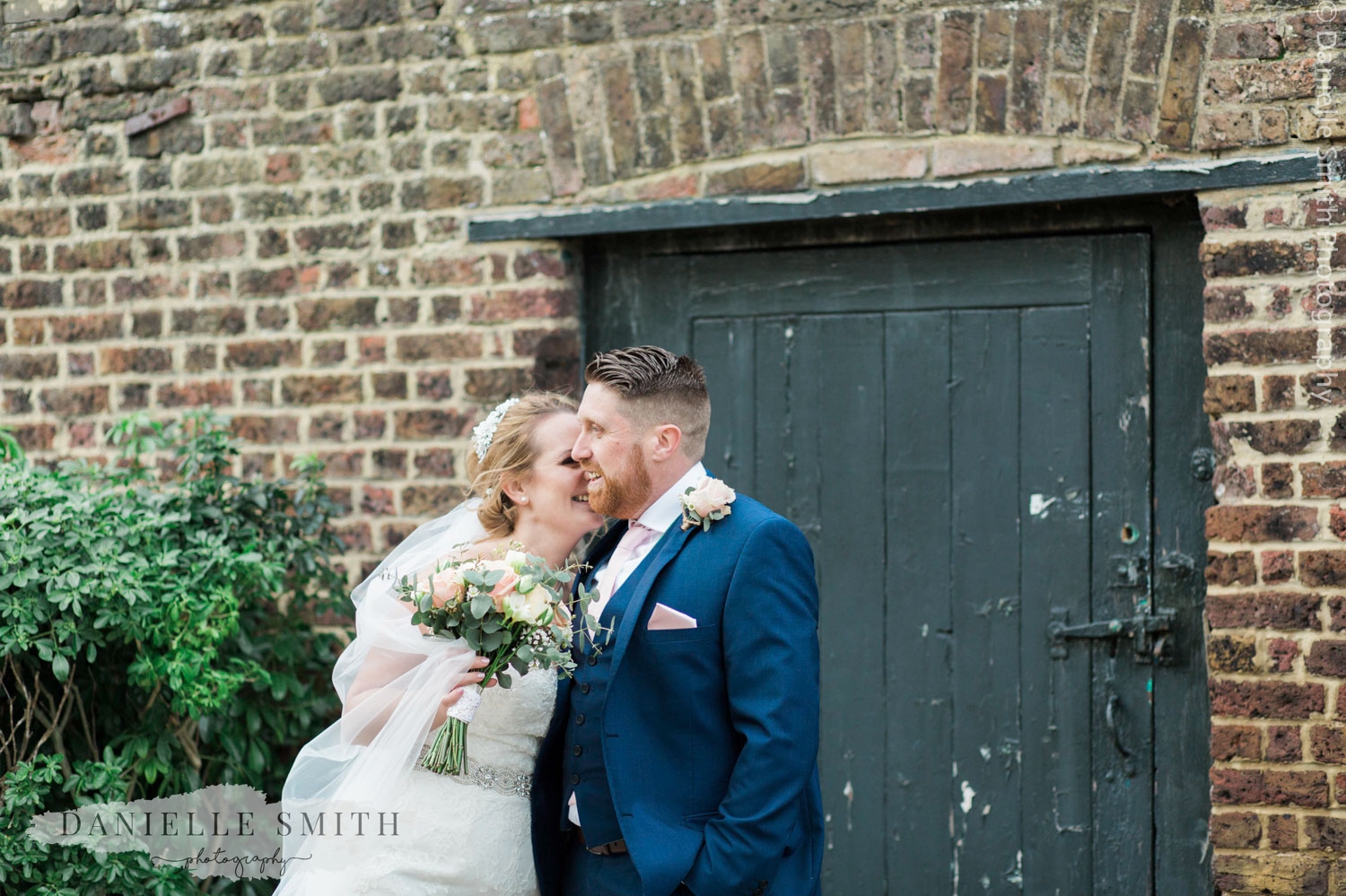 couple laughing on wedding day
