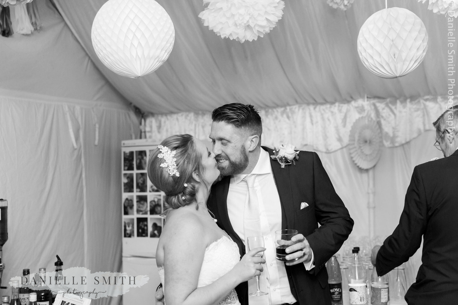 bride and groom kiss