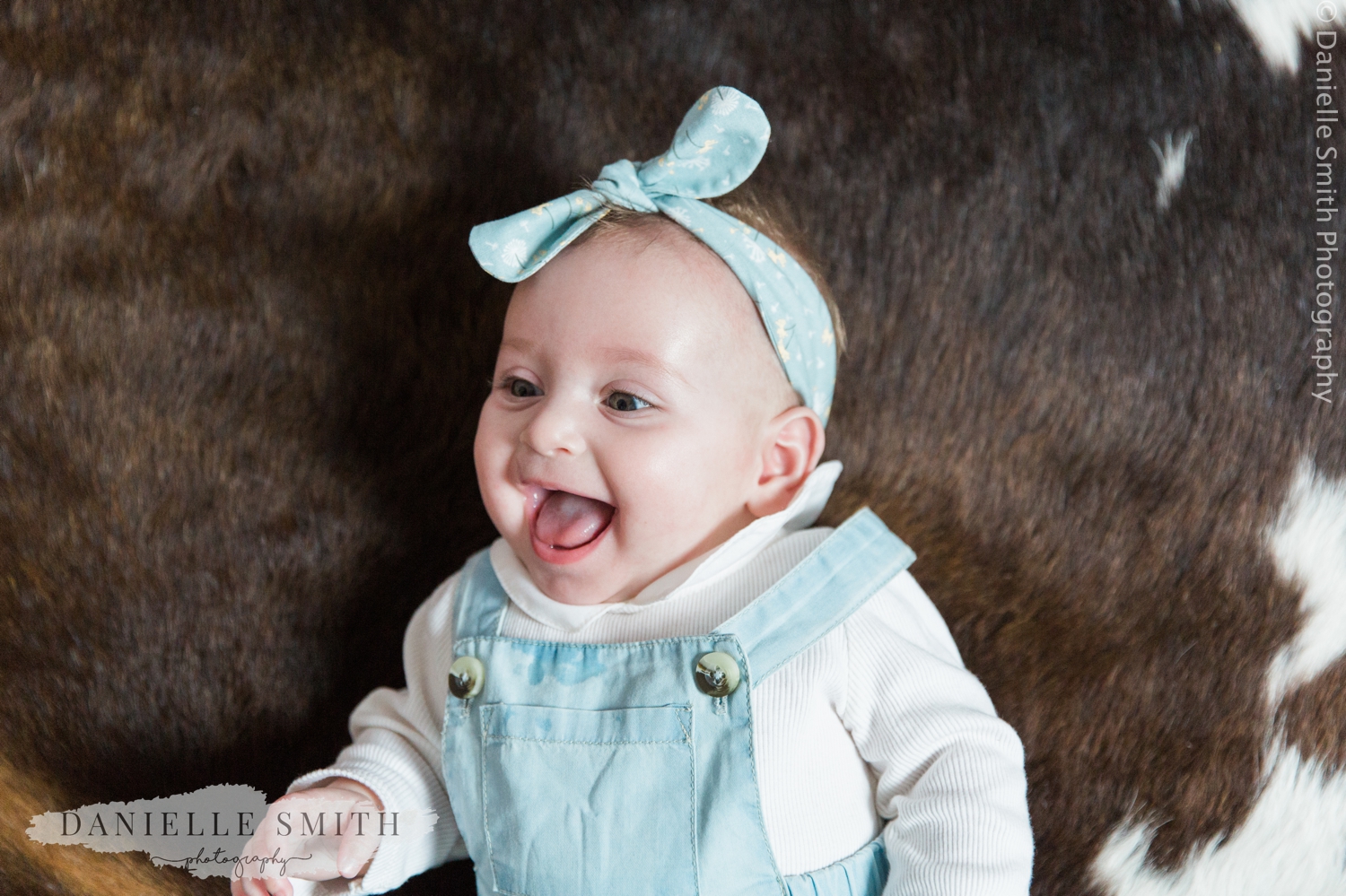 baby girl laughing - natural family photos