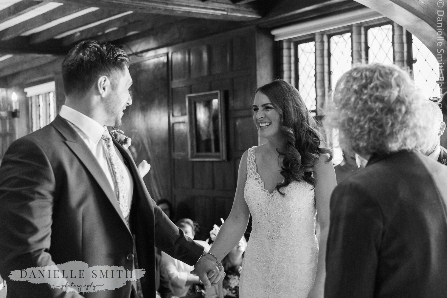 bride and groom smiling - ingatestone hall wedding