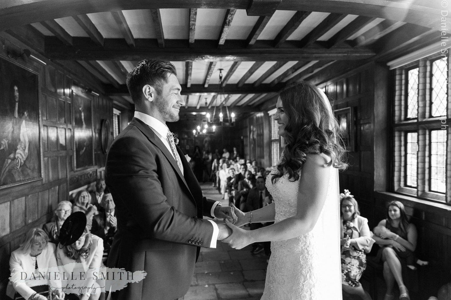 bride and groom tying the knot - ingatestone hall wedding