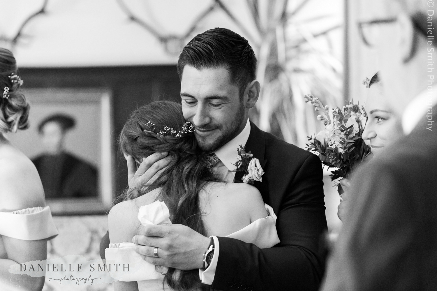 groom hugging his niece