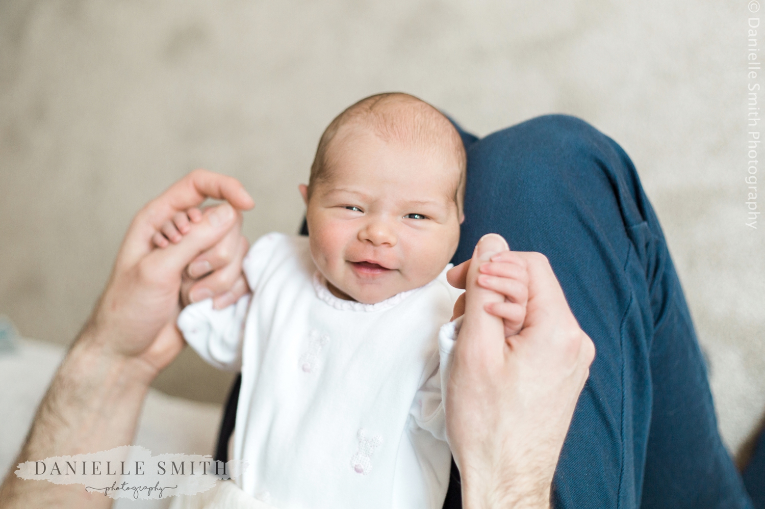 newborn baby smiling - natural newborn photography