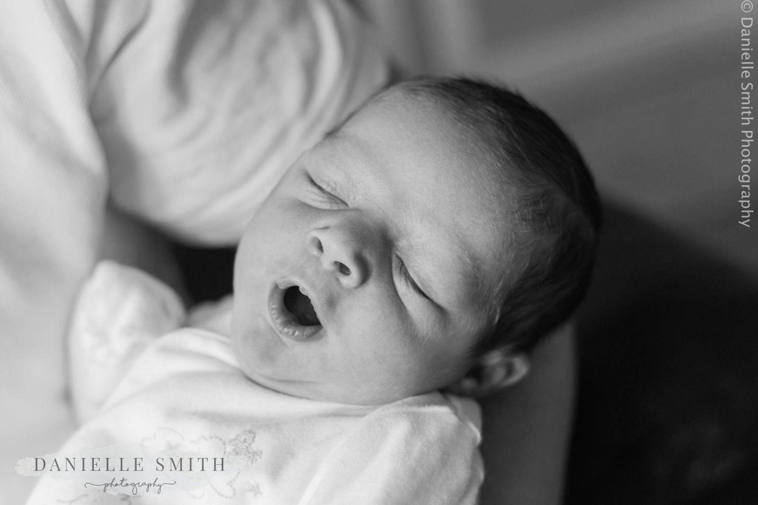 newborn baby yawning