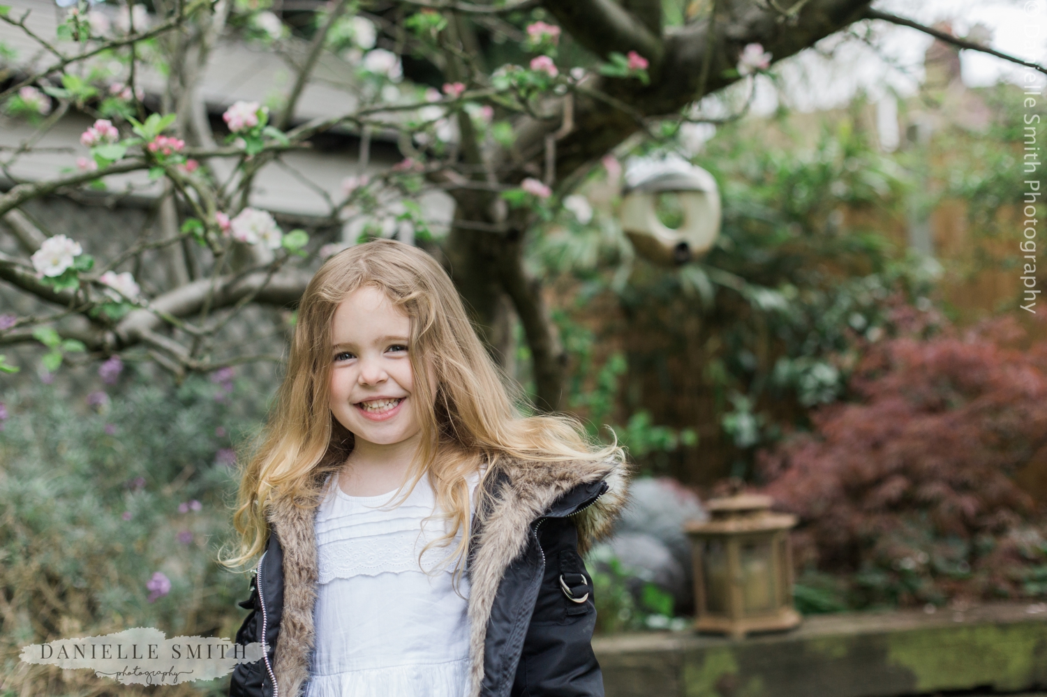 little girl in garden