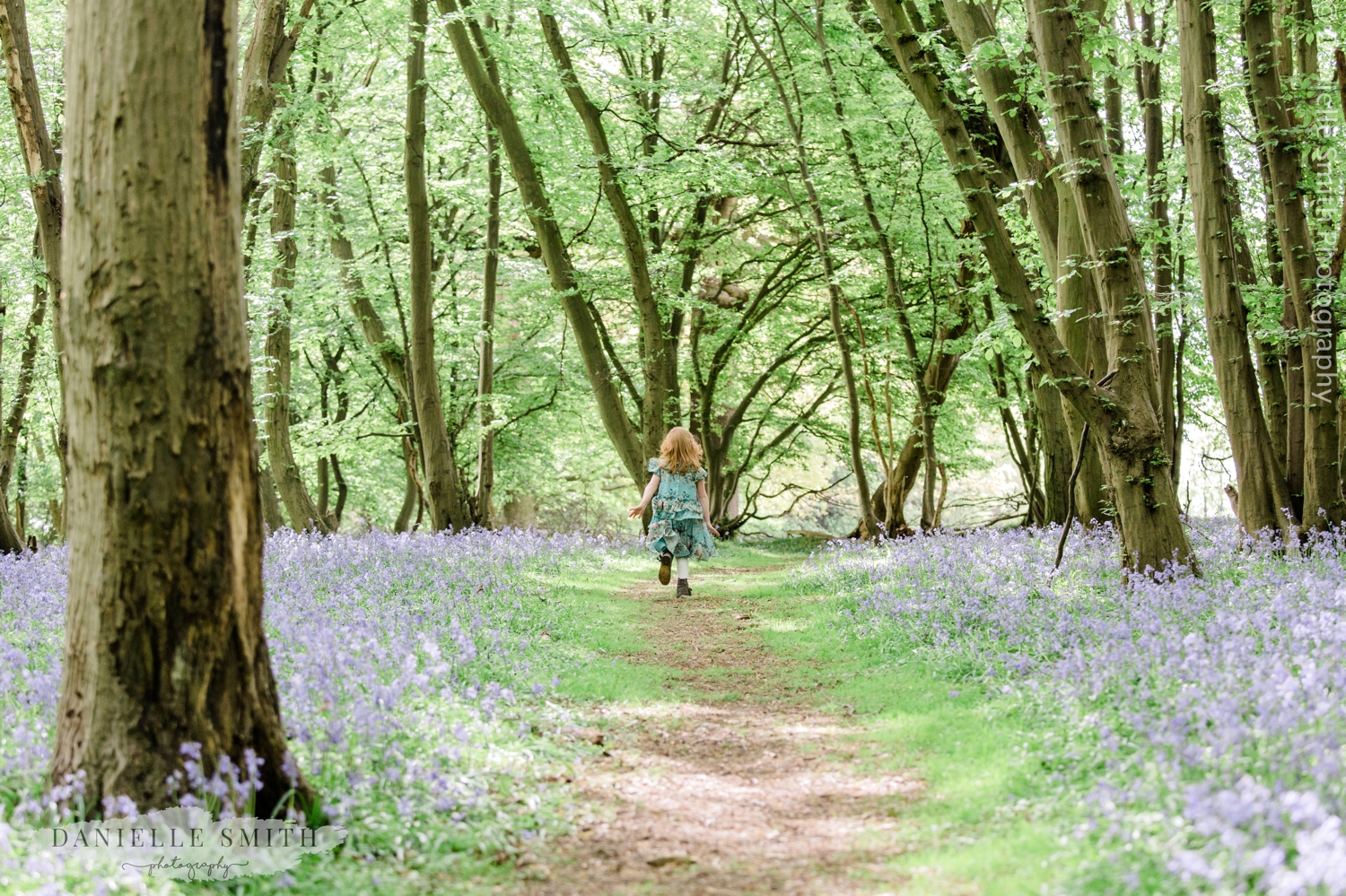 girl running into the forest