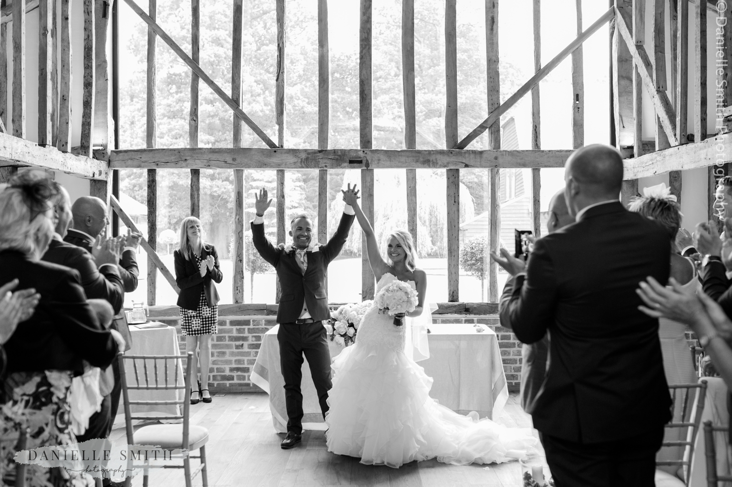 married! bride and groom celebrate at blake hall