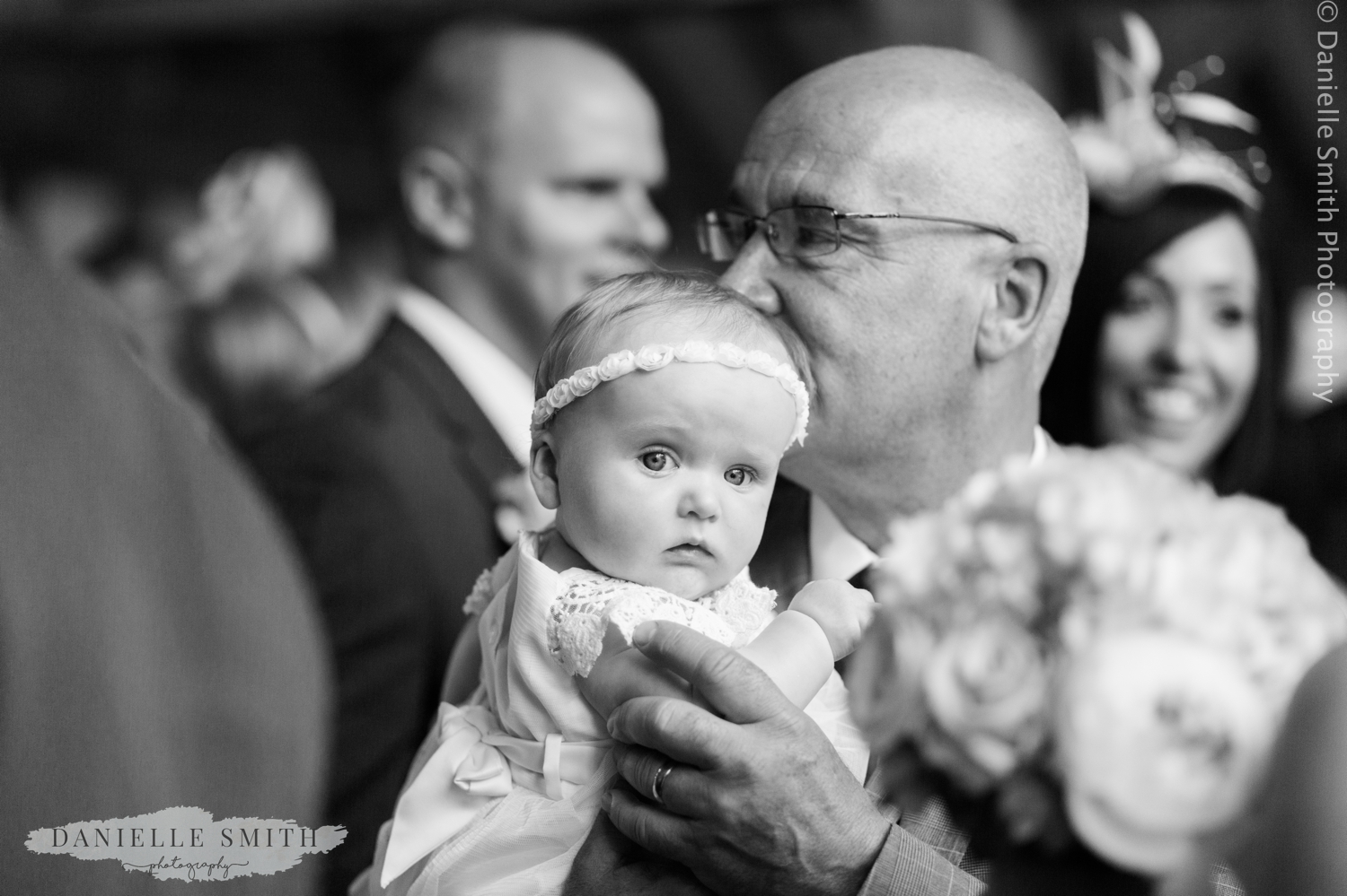 baby flower girl and granddad