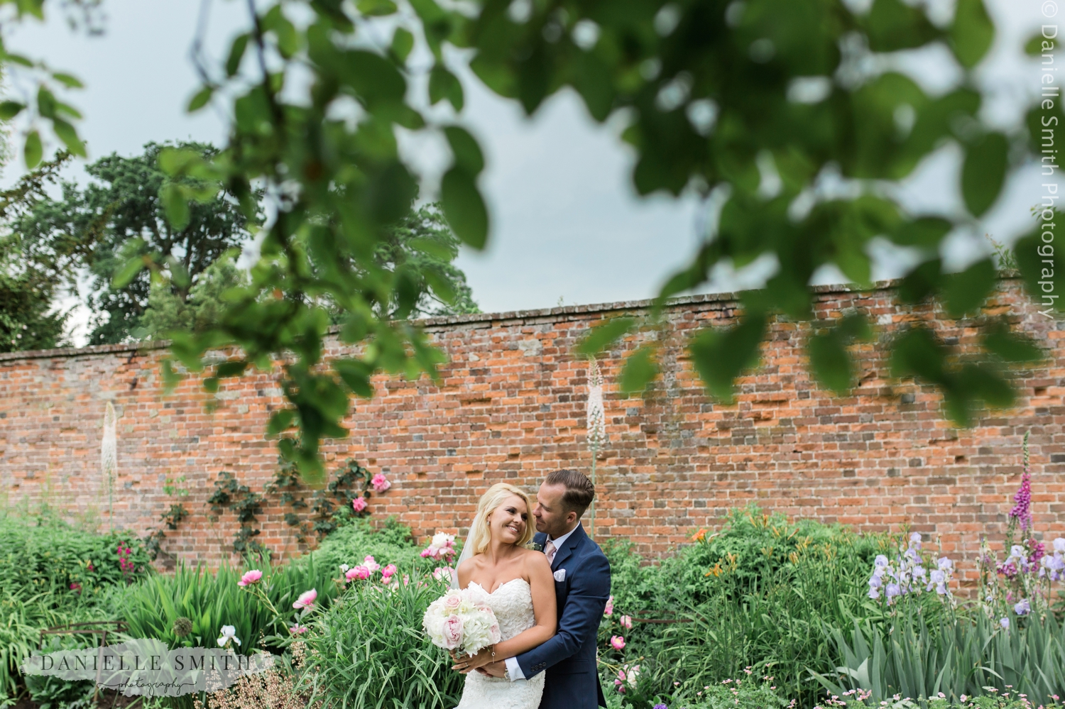 couple in gardens - blake hall wedding photography