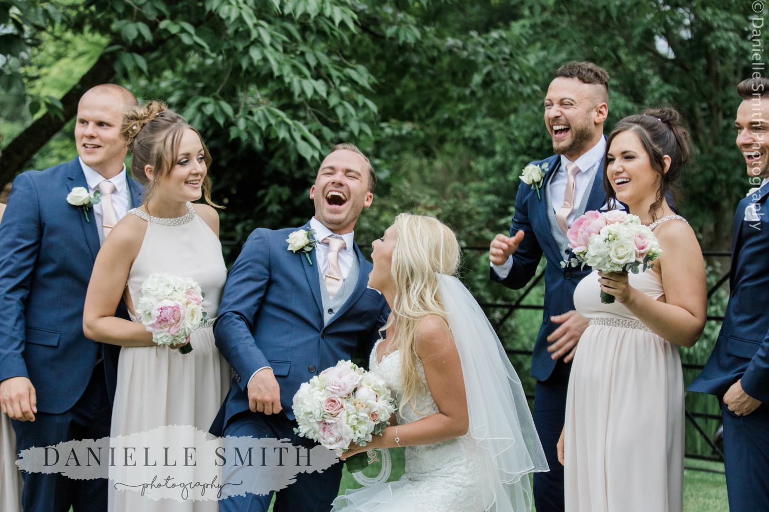 bridal party laughing at blake hall