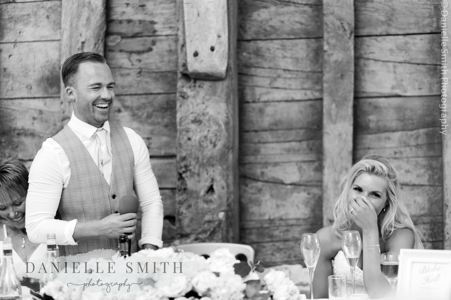 bride shocked and groom laughing