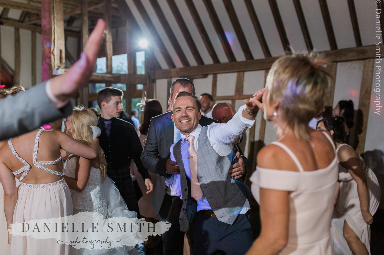 groom dancing into night