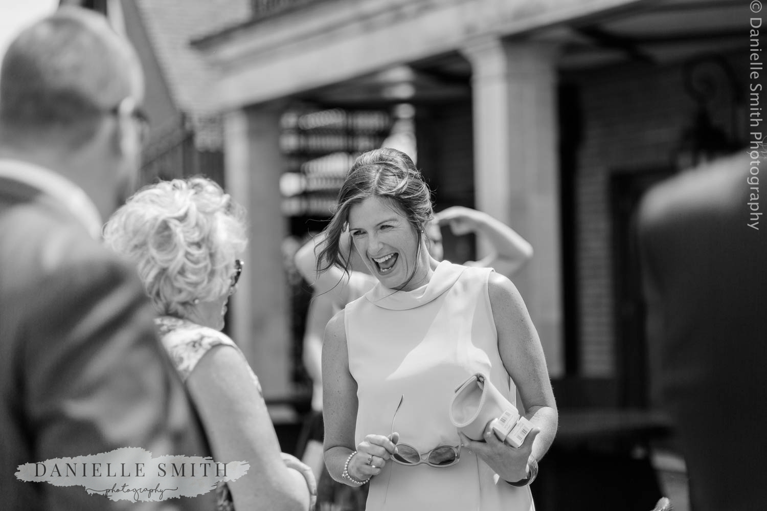 lady laughing at wedding