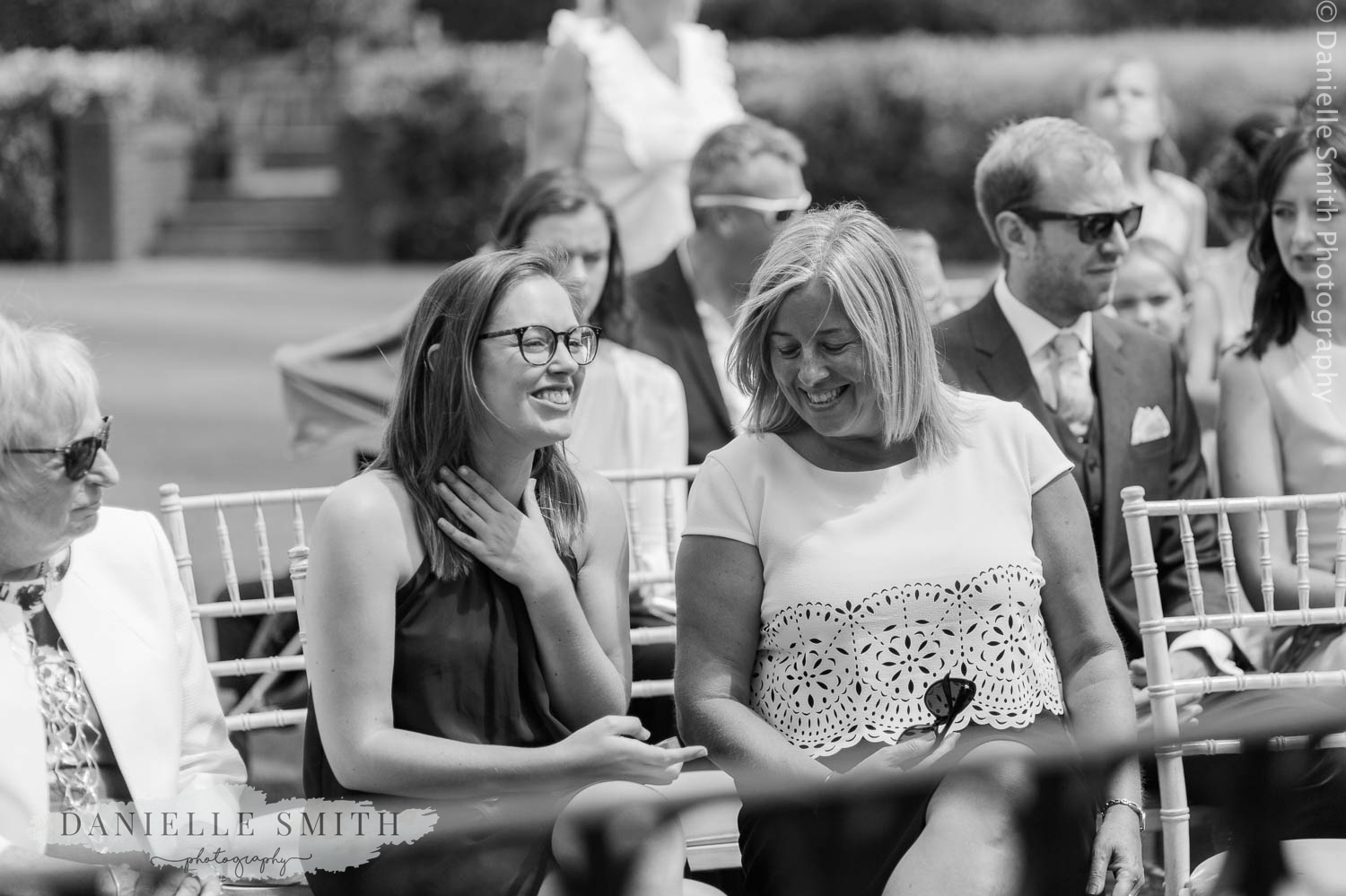 wedding guests waiting for ceremony to begin