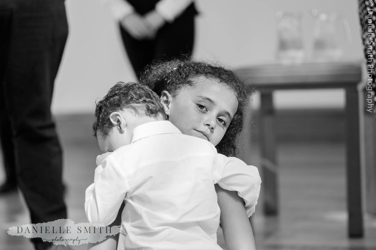 flower girl holding page boy