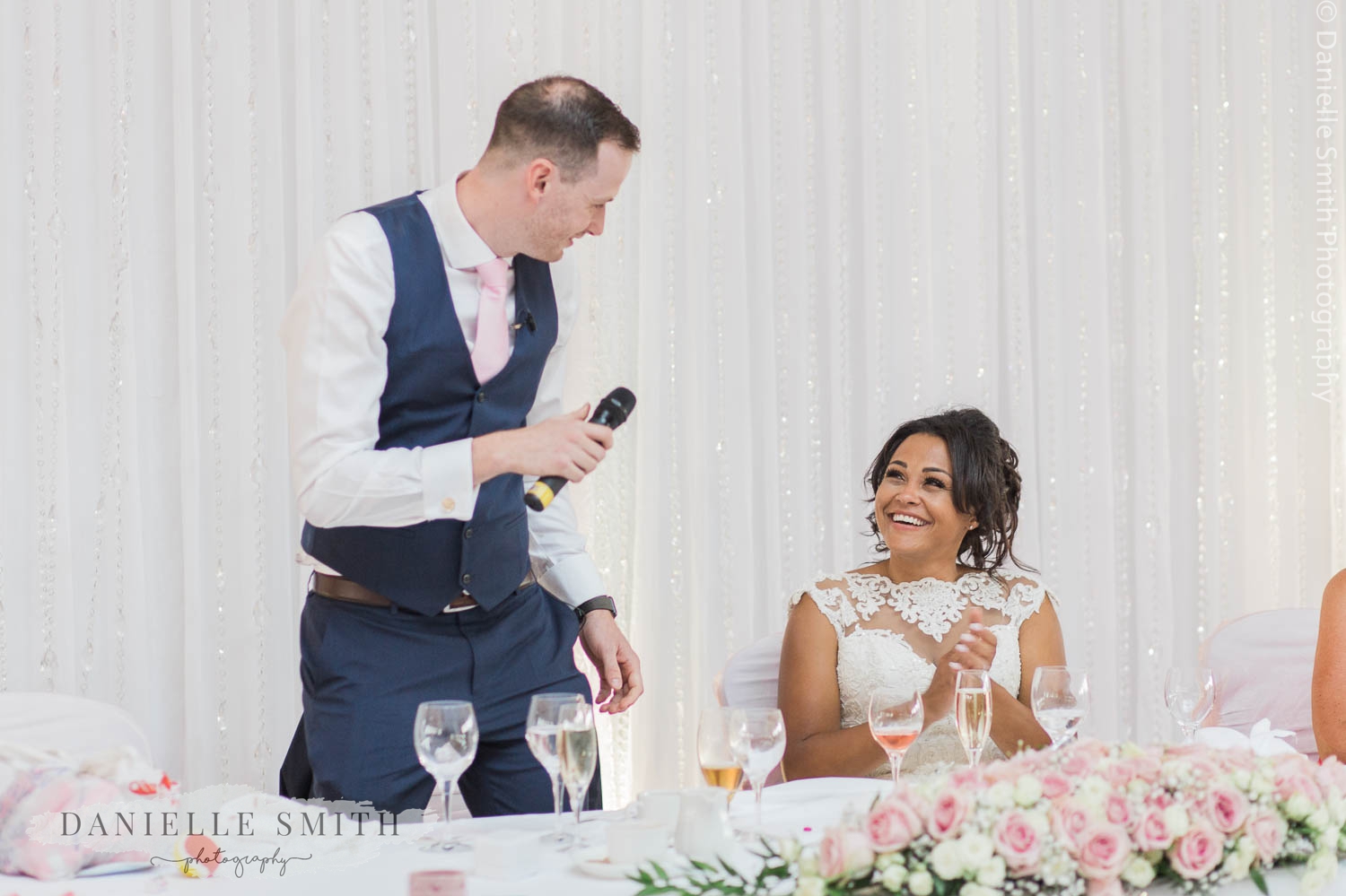 bride and groom during speeches at stock brook manor