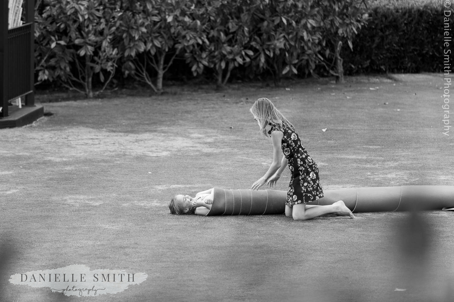kids playing games in garden at wedding