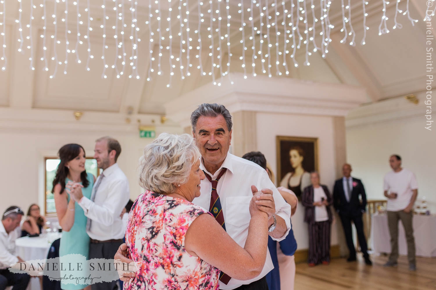 older couple dancing at wedding