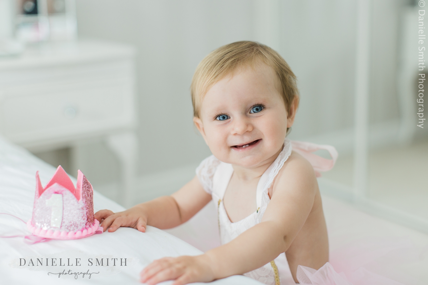 toddler smiling - first birthday photo shoot