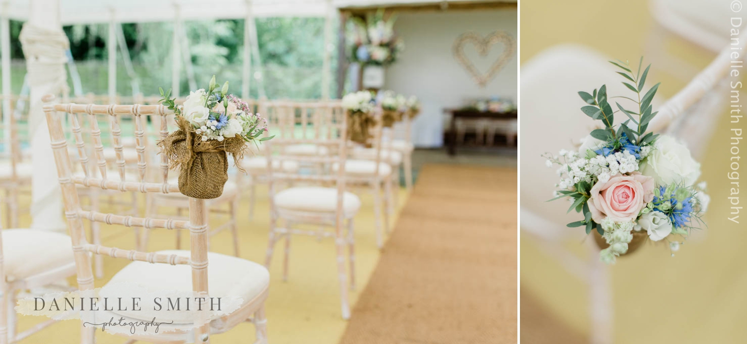 pastel flowers hanging on chairs at houchins