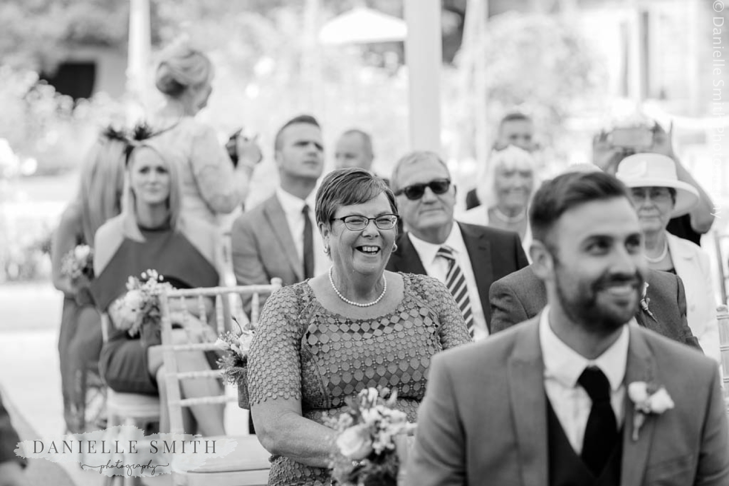 wedding guest laughing - houchins wedding photography