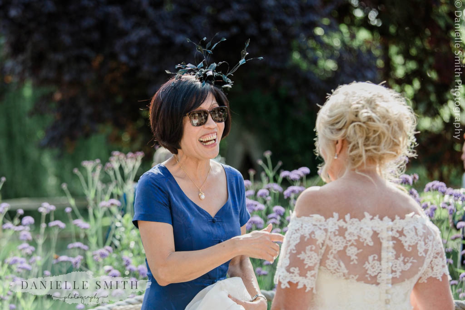 chinese wedding guest laughing