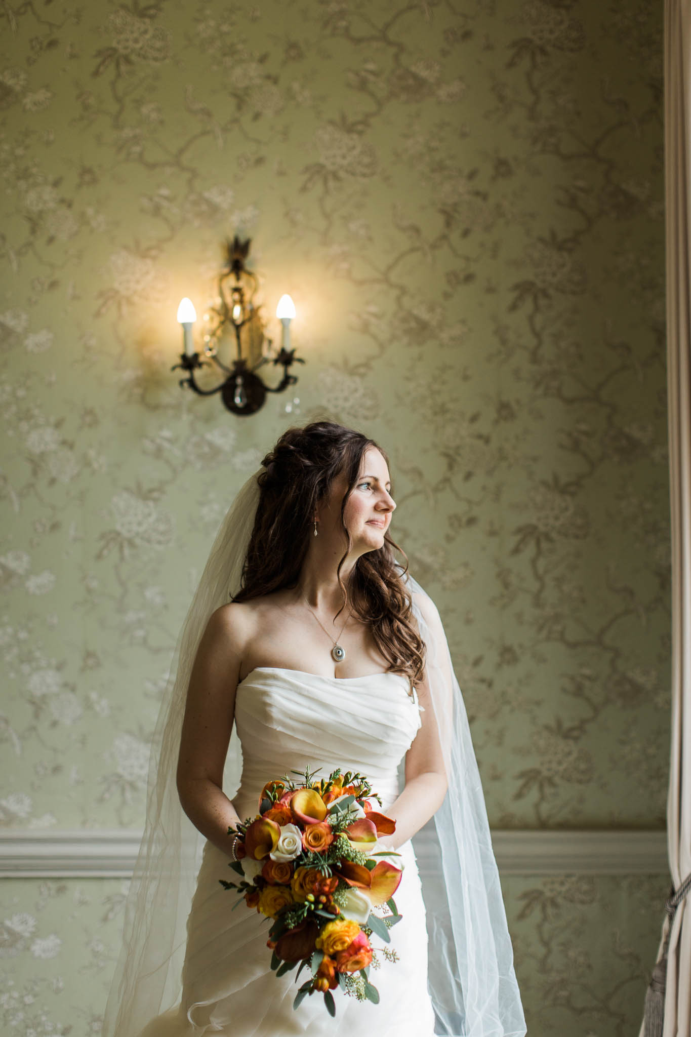 bride with autumn bouquet - morden hall wedding