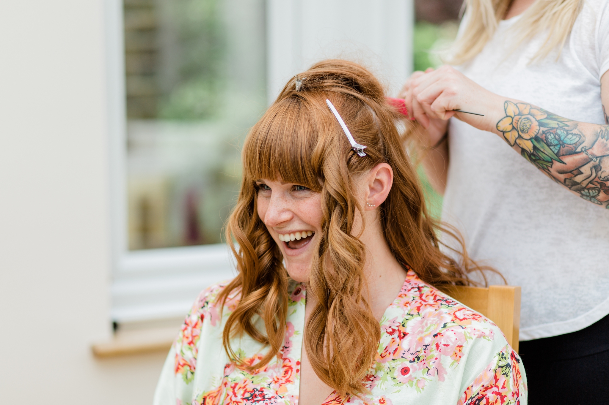 bridesmaid having her hair done - relaxed marquee wedding